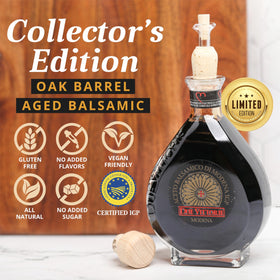 Pouring Oro Gold balsamic from a glass bottle with cork pourer