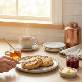 Duffy's Crumpets as a tea-time snack, pairing well with tea.