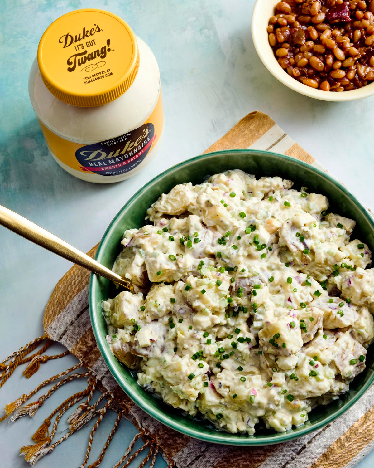 Spread Duke's mayo on a sandwich for creamy tang.