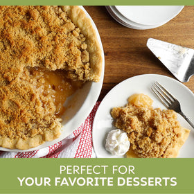 Duncan Hines Comstock apple pie filling on a warm slice of pie