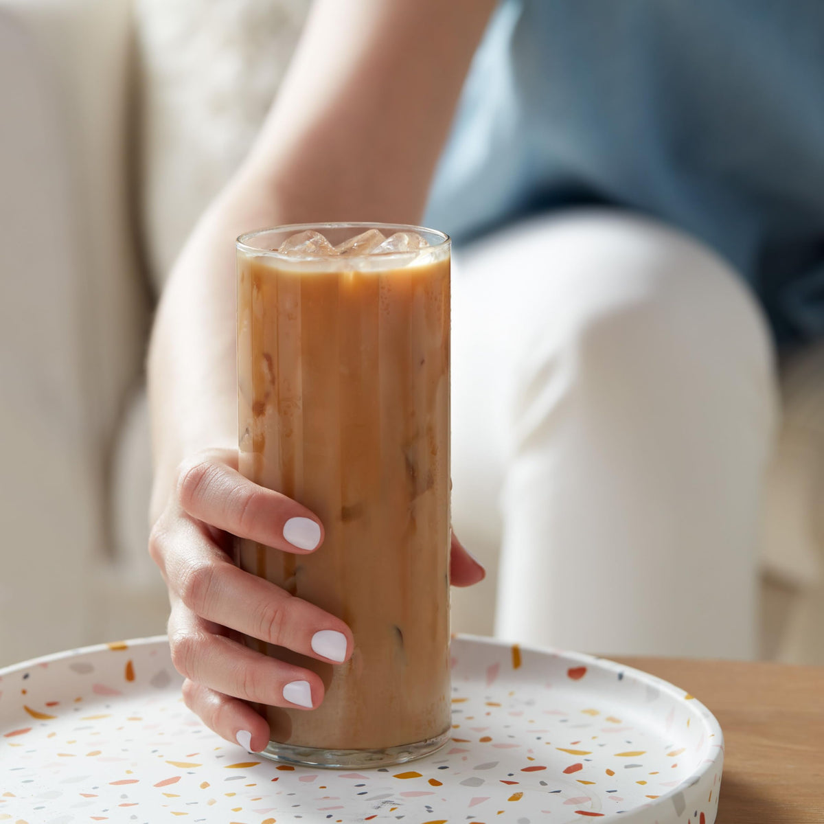 Dunkin Cold powder packets stirred into cold water to make iced coffee.