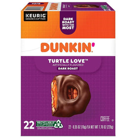 Dunkin Donuts Turtle Love mug beside machine for quick brew convenience