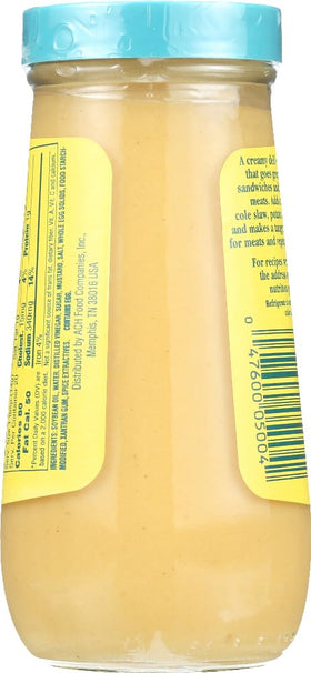 Durkee Salad Sauce bottle atop a fresh salad for zesty dressing without heavy cream.