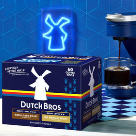 Dutch Bros coffee pod brew pouring into a cup, inviting aroma.