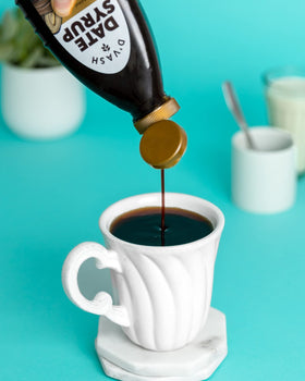 D'Vash Date Syrup label close-up highlights 2-pack value.