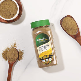 Dwaraka Garam Masala sprinkled on a dish to enhance flavor.