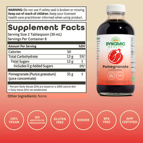 Dynamic Health Pomegranate Juice Concentrate being poured into a glass for a refreshing drink.