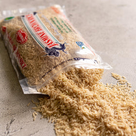 Dynasty Jasmine Brown Rice cooked bowl showing fragrant, fluffy texture