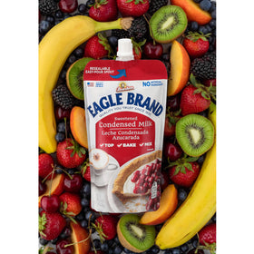 Topping fruit or pancakes with Eagle Brand condensed milk