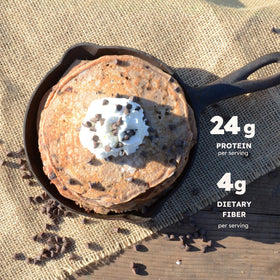 Earth Fed Muscle waffle chocolate chip served hot with syrup for a protein-rich meal