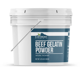 Earthborn Elements beef gelatin powder scoop being added to a hot pot to thicken sauces