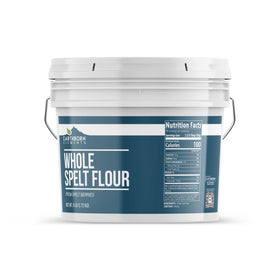 Earthborn Elements spelt flour bucket close-up showing rich texture for baking