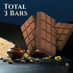 Eastanbul Dubai Pistachio chocolate bar cross-section reveals kataifi crunch and pistachio filling.