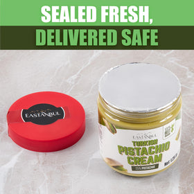 Eastanbul Pistachio Cream jar with pistachios visible nearby.