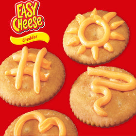EASY CHEESE cheddar spray topping nachos for an instant cheesy boost.