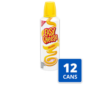EASY CHEESE cheddar spray action on a cracker for fast snack prep.