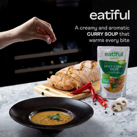 Close-up of organic vegetables and coconut cream in EATIFUL curry soup
