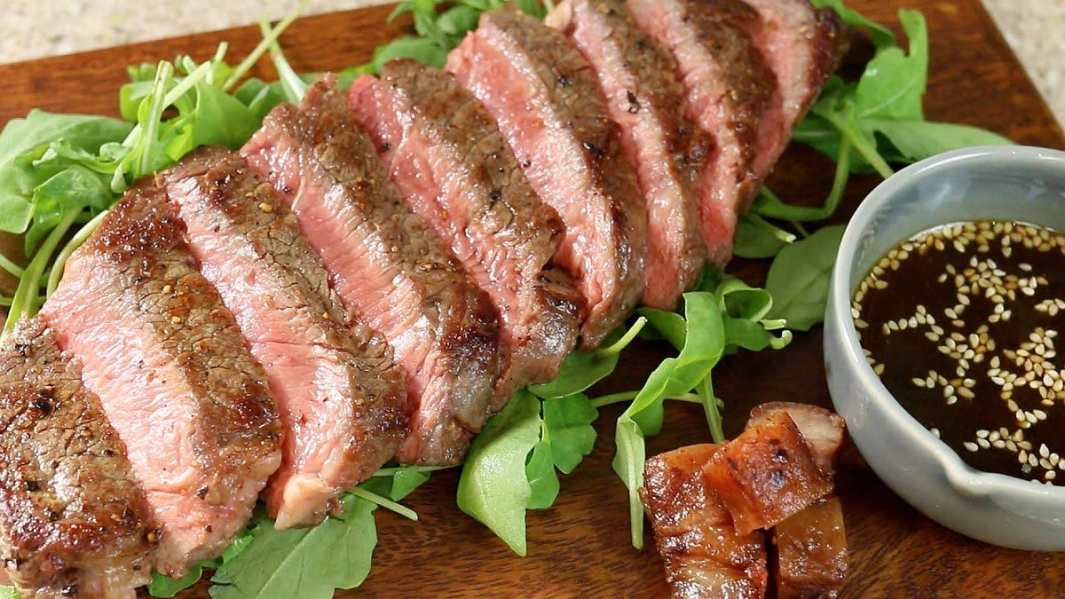 Label highlights Mild variant for approachable grilling and dipping.