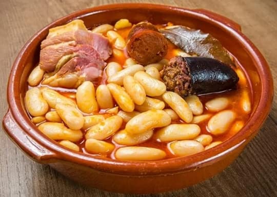 Close-up of El Fabada beans and chorizo showing hearty texture.