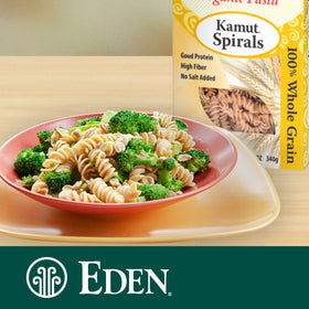 Close-up of Eden Kamut kernels showing large golden grains.