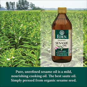 Close-up of Eden Organic Sesame Oil highlighting golden color and light filtration.
