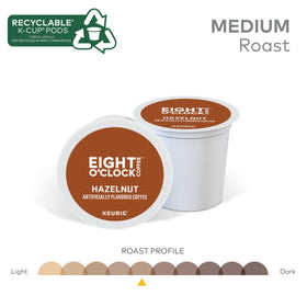 Eight O'Clock Hazelnut pods stacked in tray highlight compact packaging.