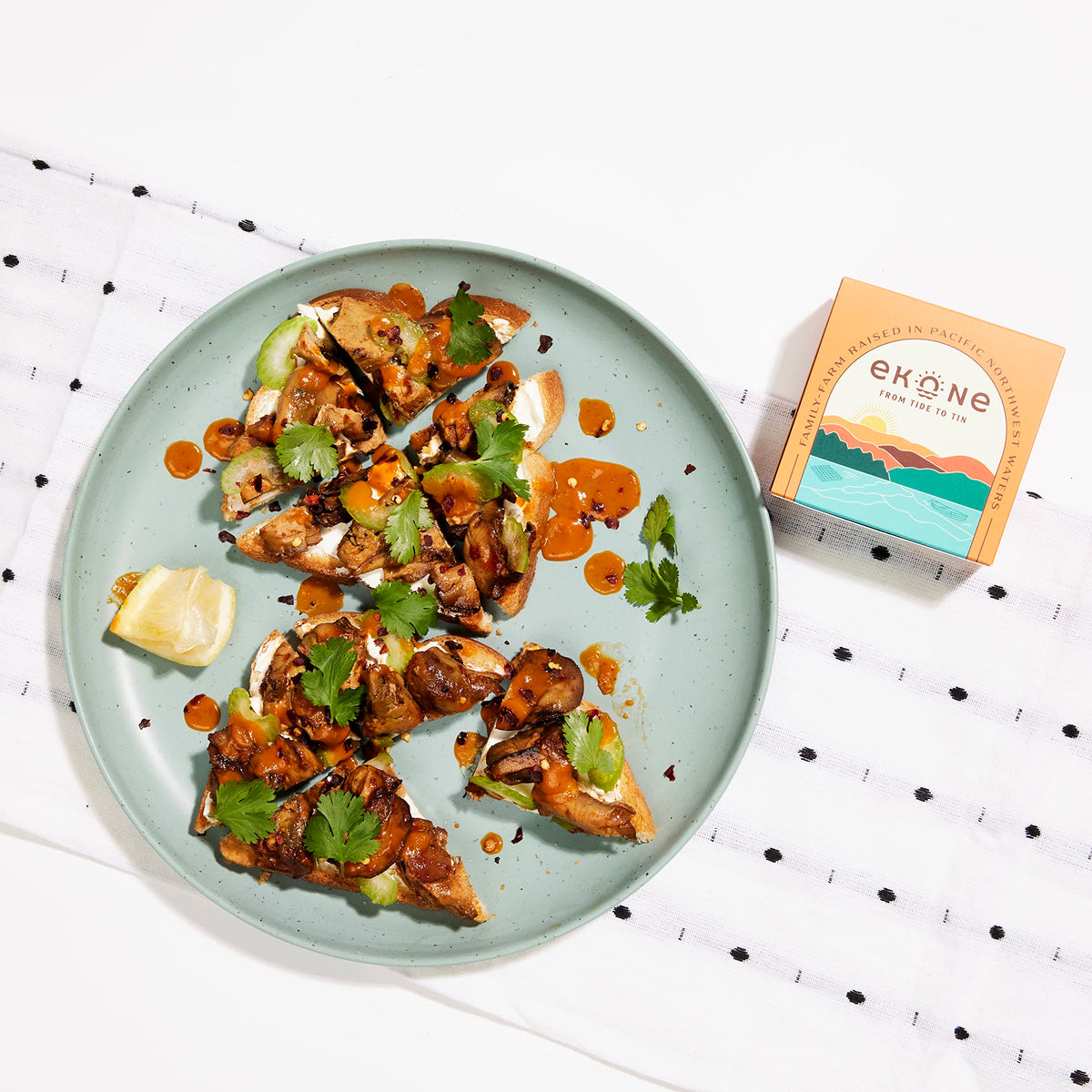 Ekone lemon pepper smoked oysters tin adding citrus brightness to meals.