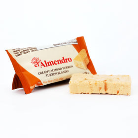 El Almendro Creamy Almond Turron close-up of almonds emphasizes rich, nutty flavor.