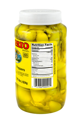 El Pato peppers spoon dipping to reveal tangy heat