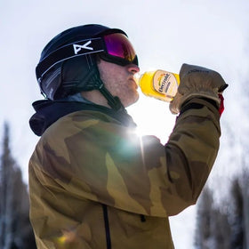 Electrolit athlete hydrating during training session.