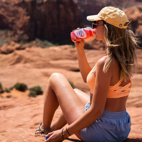 Electrolit Strawberry sports bottle ready for hydration during training.