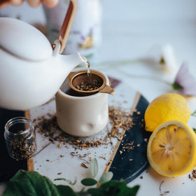 Elanen Naturals brewed tea cup with steam inviting daily relaxation