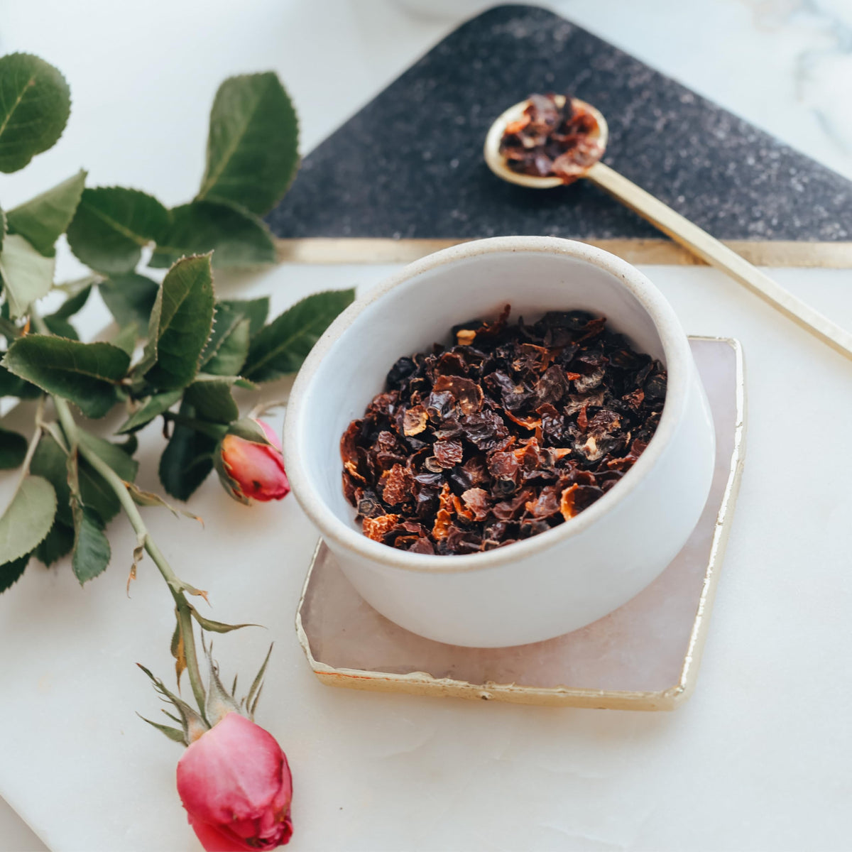 Elanen Naturals steeping rosehips tea, release floral tart notes during infusion.