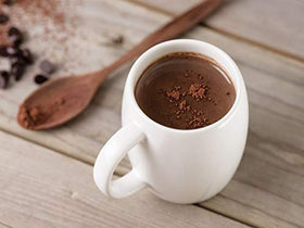 Hot chocolate cup prepared with Elite Chocolit for a comforting gluten-free treat.