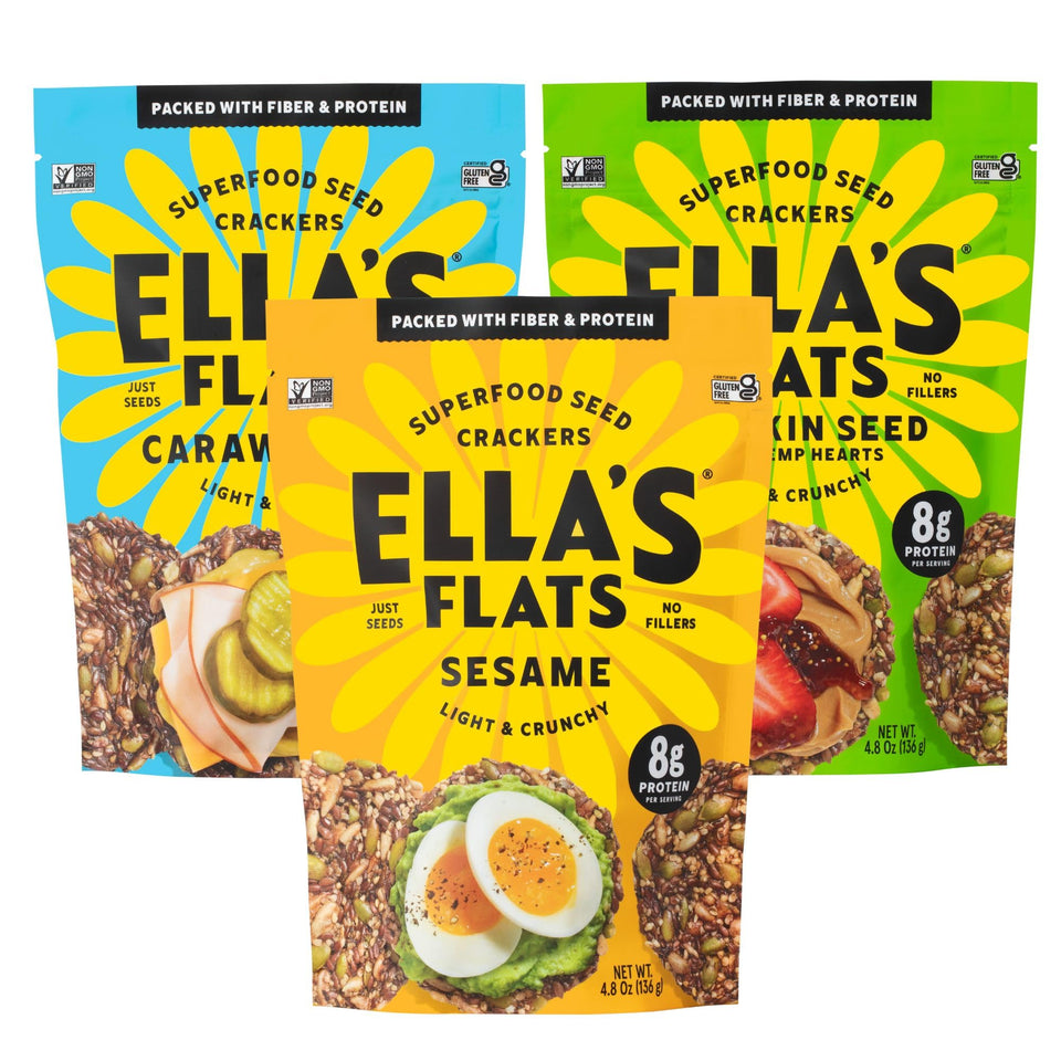 Ella's Flats sesame crisps in resealable pouch for on-the-go snacking.