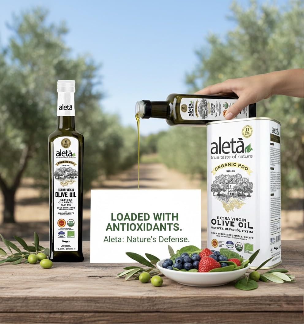 Ellora Farms Aleta bottle beside a green salad, finishing oil for greens.