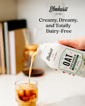Elmhurst 1925 Unsweetened Oat Creamer on kitchen counter highlighting simple ingredients