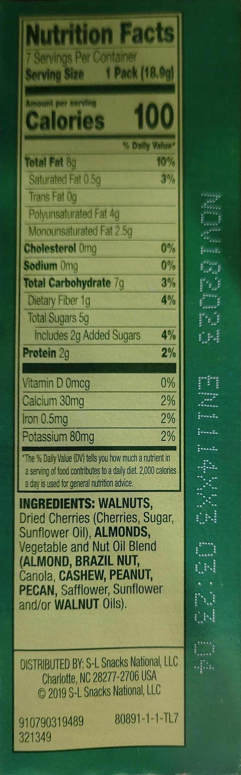 Emerald 100 calorie pack nuts close-up of mixed walnuts and almonds for crunch.