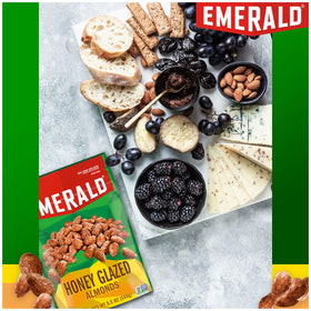 Emerald Honey Glazed Almonds in bowl showing whole nuts ready to eat.