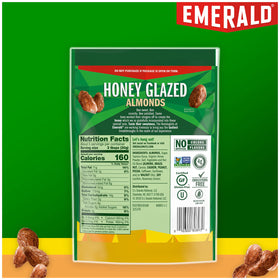 Emerald Honey Glazed Almonds ready-to-eat snack pouch on desk.