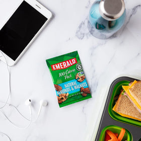 Emerald almonds and walnuts close-up texture highlighting crunch and richness.