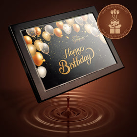Empire Delights chocolate gift basket presentation conveys an elegant gift-ready design.