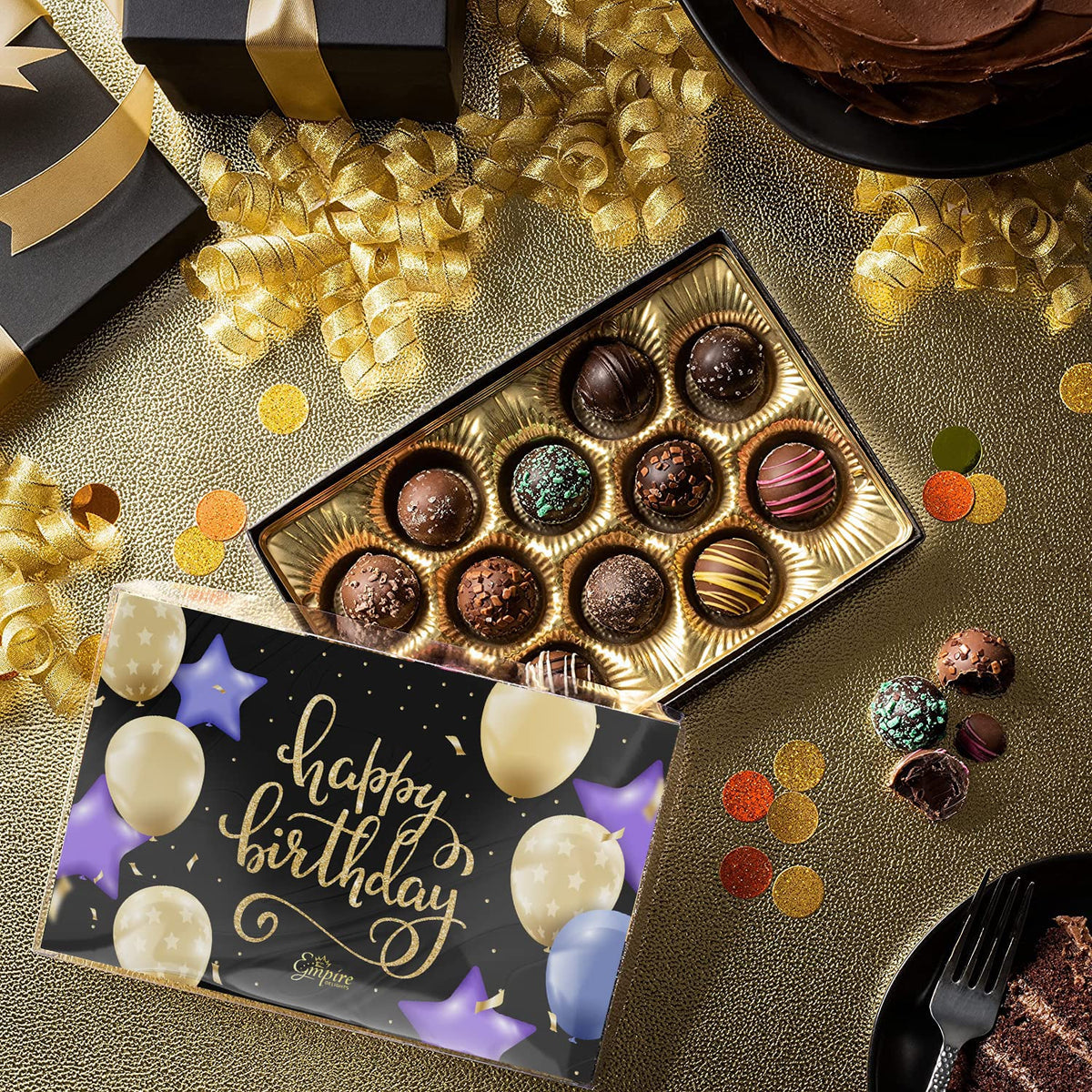 Empire Delights dark-shell truffle close-up, rich cocoa notes and indulgent bite.