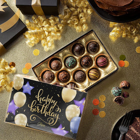 Empire Delights dark-shell truffle close-up, rich cocoa notes and indulgent bite.