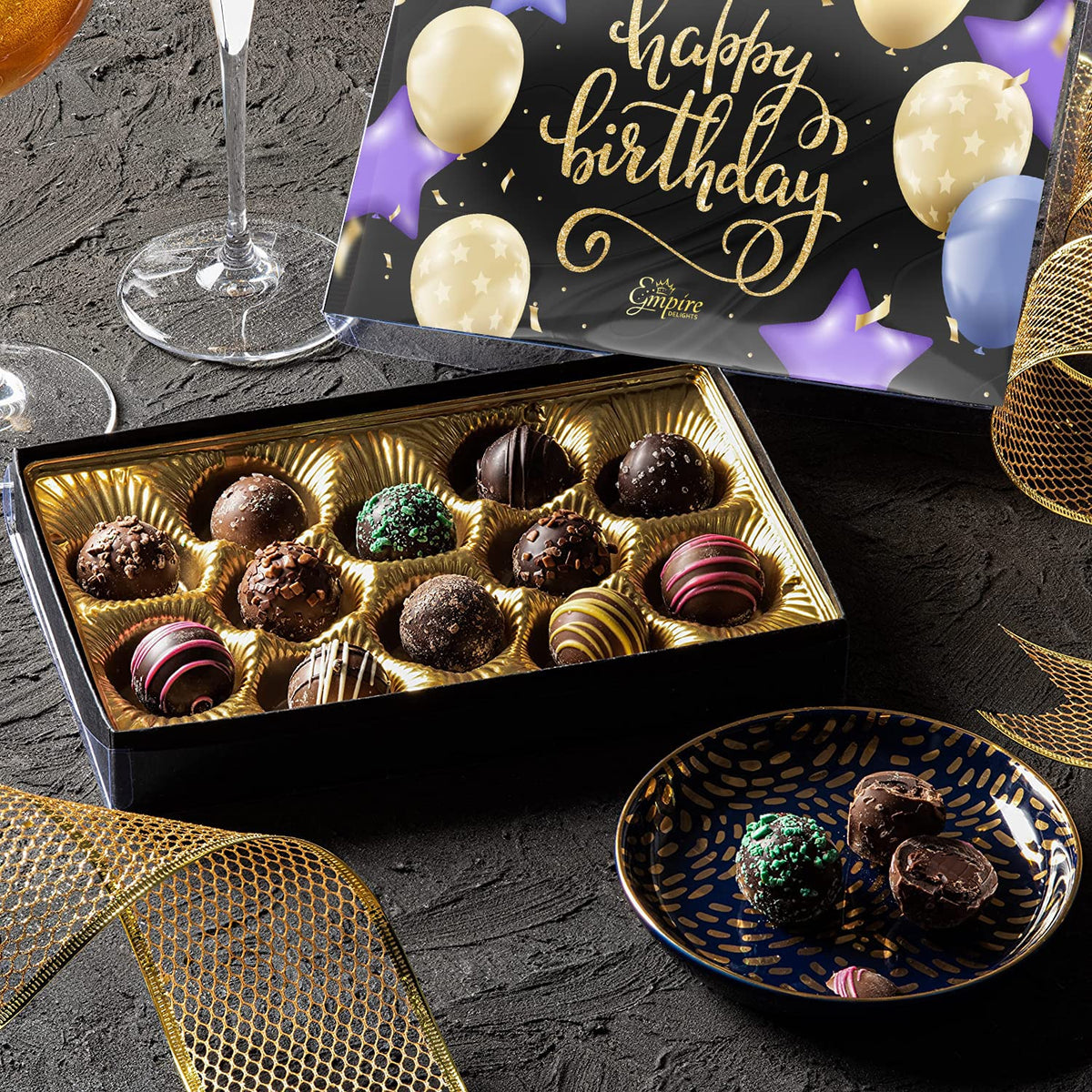 Empire Delights milk-shell truffle close-up, creamy texture and smooth melt.