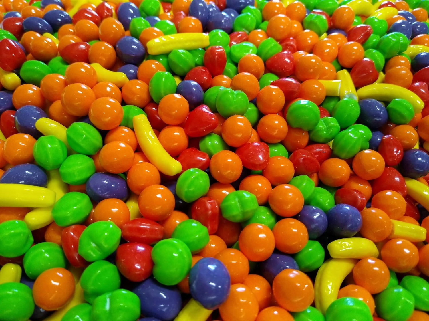 Emporium Candy banana fruit shape in a colorful bowl, ideal for party snacks
