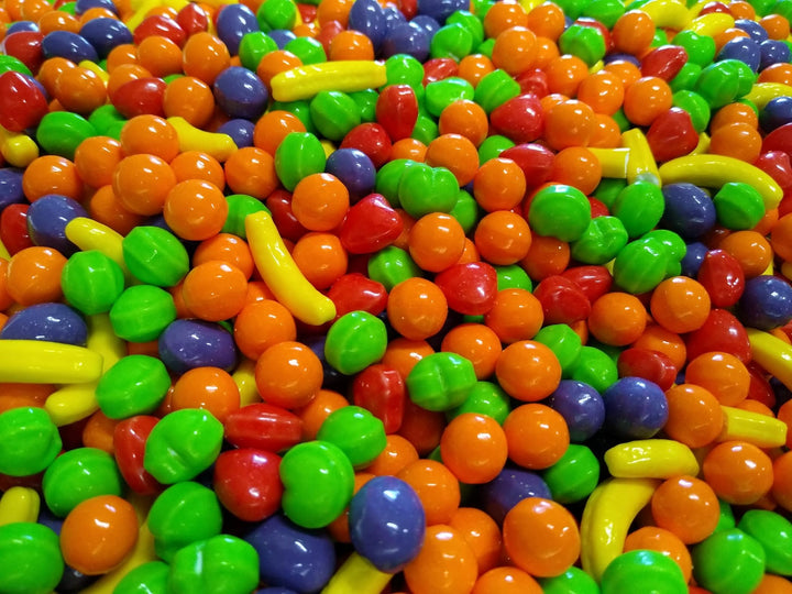 Emporium Candy banana fruit shape in a colorful bowl, ideal for party snacks