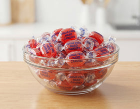 Wrapper close-up of sugar-free cinnamon candy highlighting freshness.