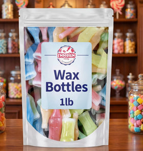 Emporium Candy wax bottle cap removed, exposing syrup ready for sipping