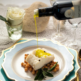 Entimio Cortese kitchen use with greens showing versatile EVOO